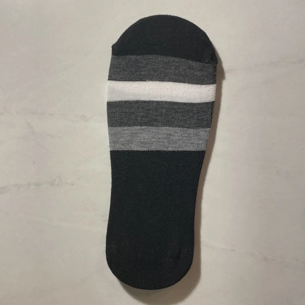 1 pair of black no show below the ankle socks w/ gray, charcoal, & white stripe​